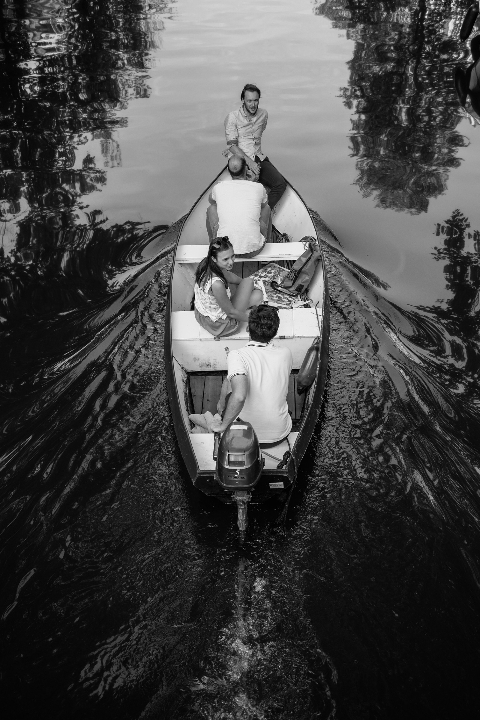 Family in canal boat Amsterdam