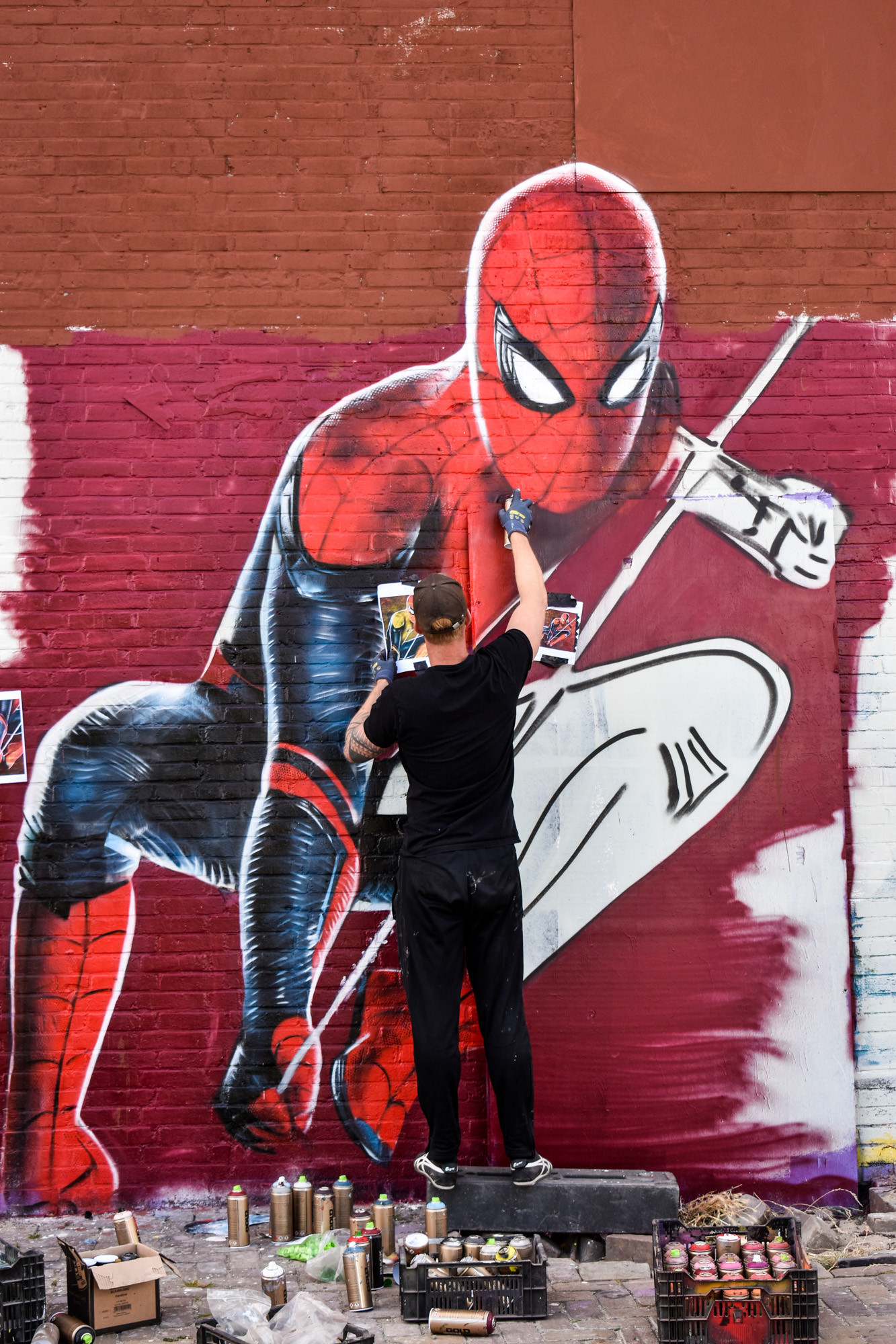 Graffiti wall art artist painting in Amsterdam