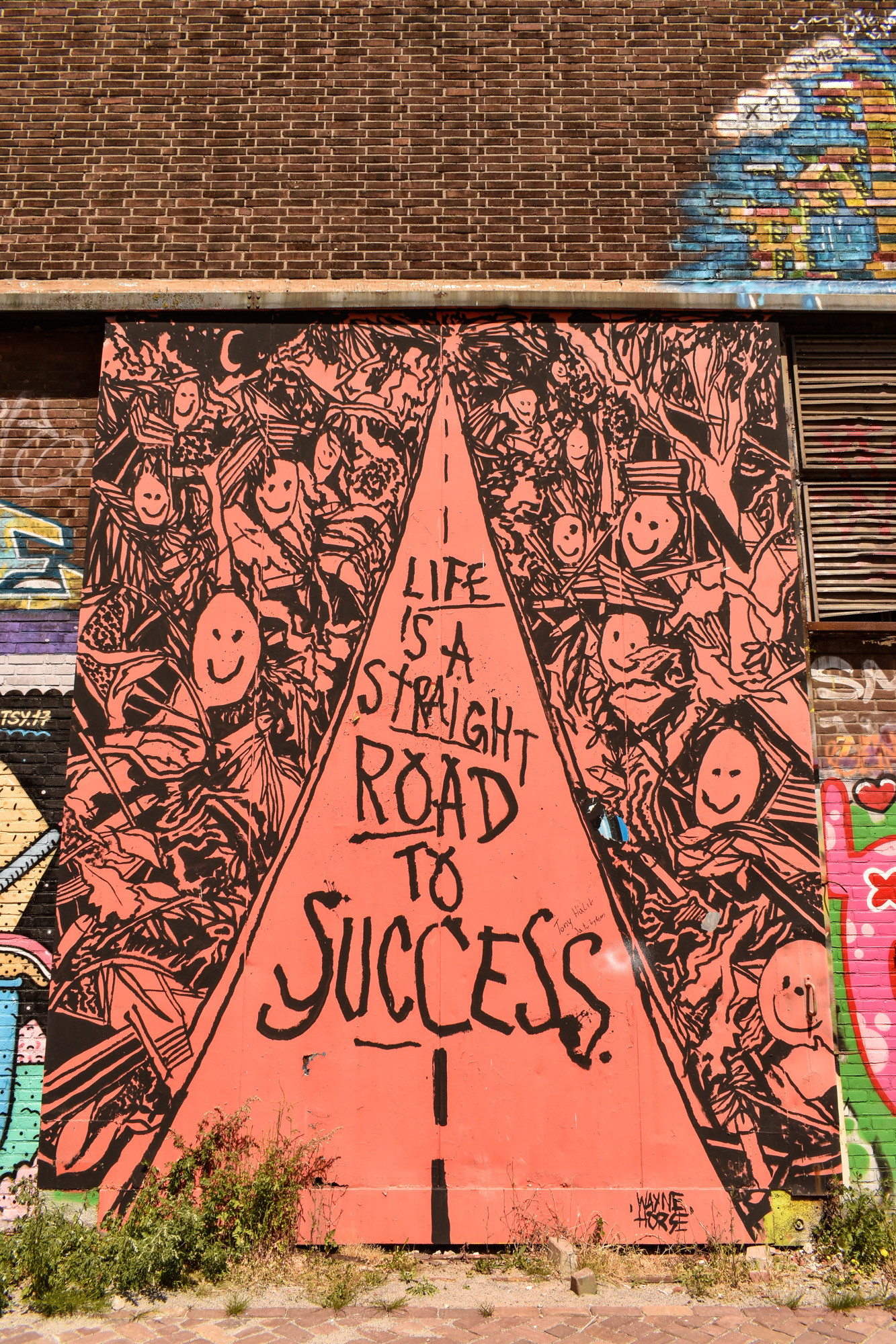 Life is a straight road to success street art Amsterdam