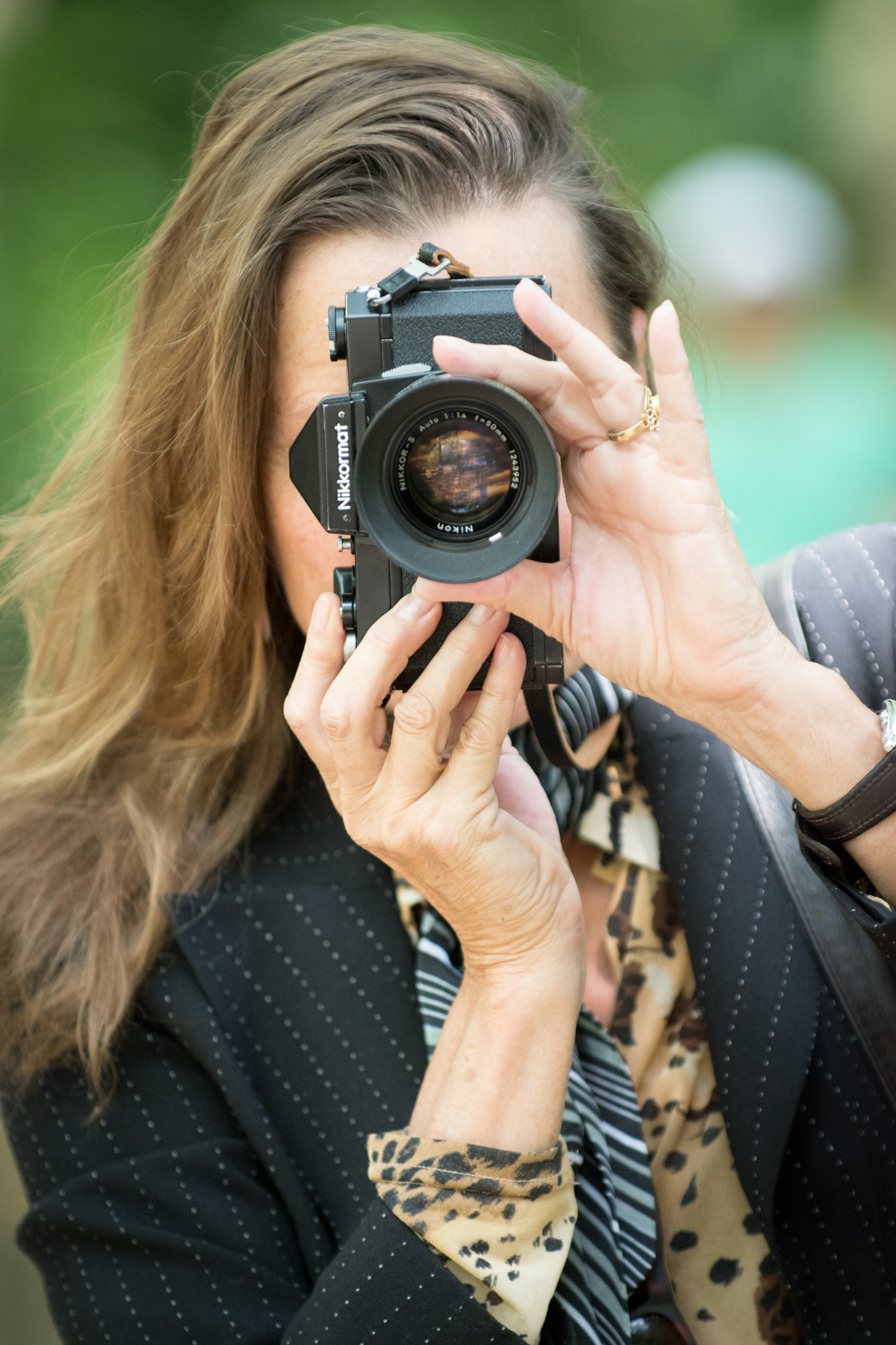 Nikon Nikkormat Amsterdam photo tours, woman holding camera