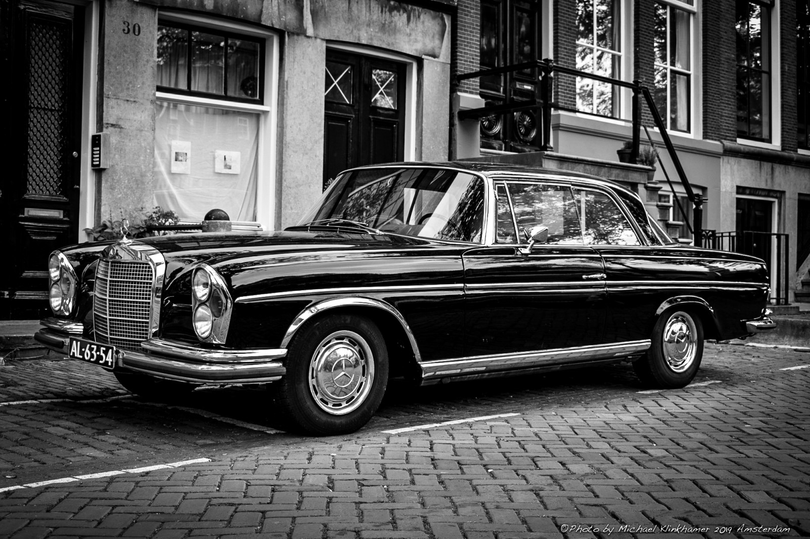 Black Mercedes Benz 280SE Coupe