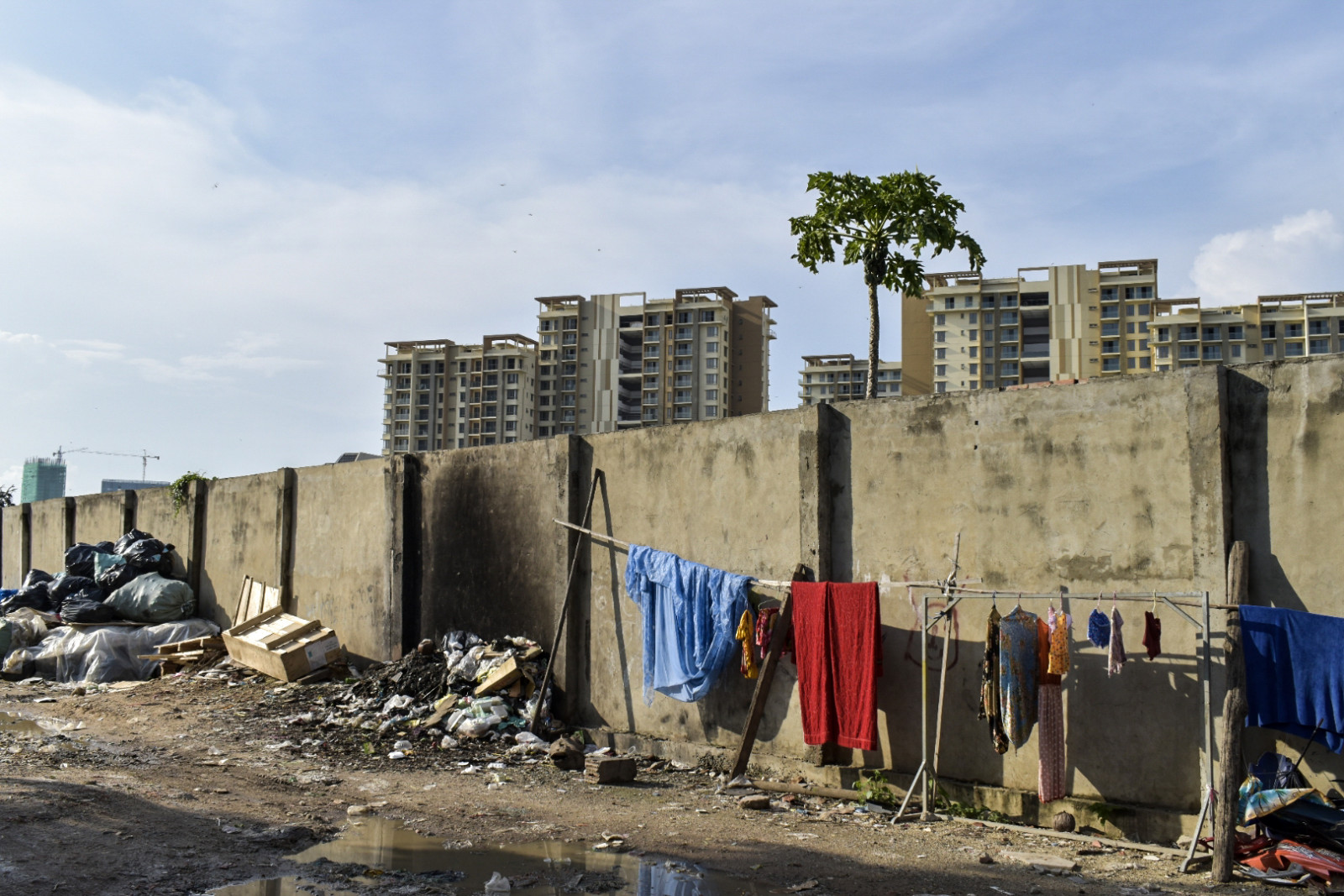 Phnom Penh city walls with garbage