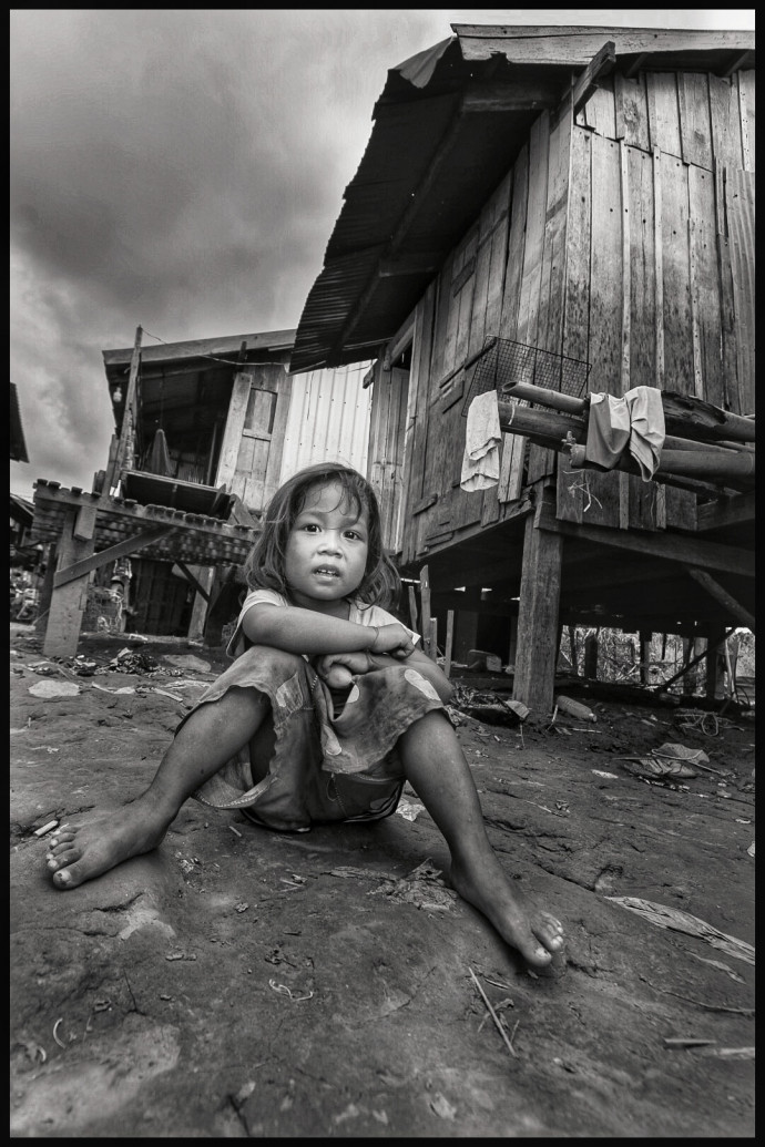 When will the poverty in the slums of Phnom Penh end?